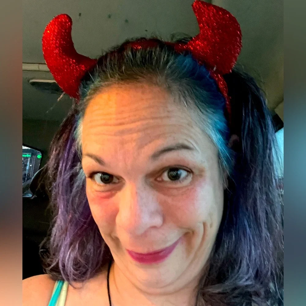 It’s a Red Devil Headband. The whole thing is covered with red sparkly glitter.